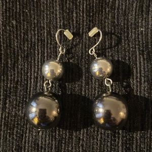 Double sphere dangle earrings.